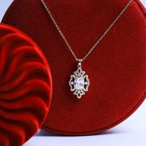 Gorgeous Gold Necklace With Sparkling Zircon Stones And A Colorful Gem Standing Out With Elegance