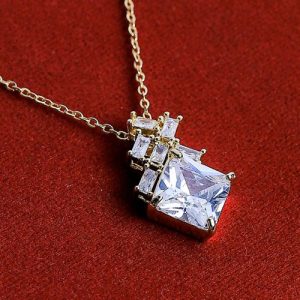 Distinctive Design Featuring A Gold Necklace With Dazzling Zircon Stones And An Eye-catching