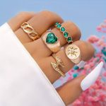 Elegant And Distinctive Rings That Highlight The Beauty Of Your Hands With A Magical Touch Of Gold And Green Stones