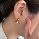 Earrings Combining Simplicity And Luxury With Balls Designs