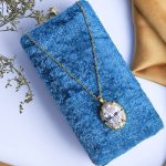 Charming Gold Necklace With Sparkling Zircon And A Colorful Central Gem That Draws Attention