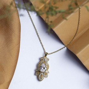 Feminine Gold Necklace Adorned With Bright Zircon And A Vibrant Central Gem