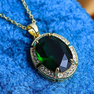 Charming Gold Necklace With Sparkling Zircon And A Colorful Central Gem That Draws Attention