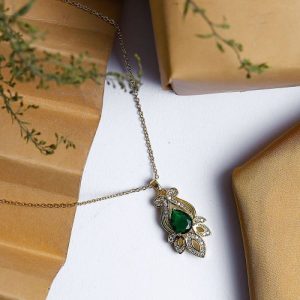 Feminine Gold Necklace Adorned With Bright Zircon And A Vibrant Central Gem