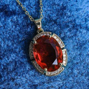 Charming Gold Necklace With Sparkling Zircon And A Colorful Central Gem That Draws Attention