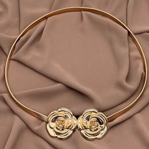 Metal belt in the shape of two roses