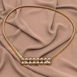 Gold ball-shaped metal belt