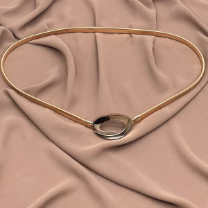 Gold metal eye-shaped belt